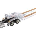 INTERNATIONAL HX520 6x4 avec remorque porte-engins et dolly, blanc