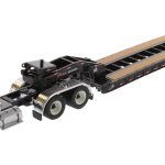 INTERNATIONAL HX520 6x4 avec remorque porte-engins et dolly, noir