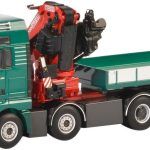 MAN TGX XXL 8x4 avec caisse et grue FASSI 1100