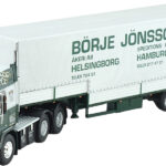 VOLVO F12 Globetrotter 6x4 avec remorque bachée 3 essieux