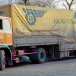 VOLVO F12 4x2 avec remorque bachée 3 essieux